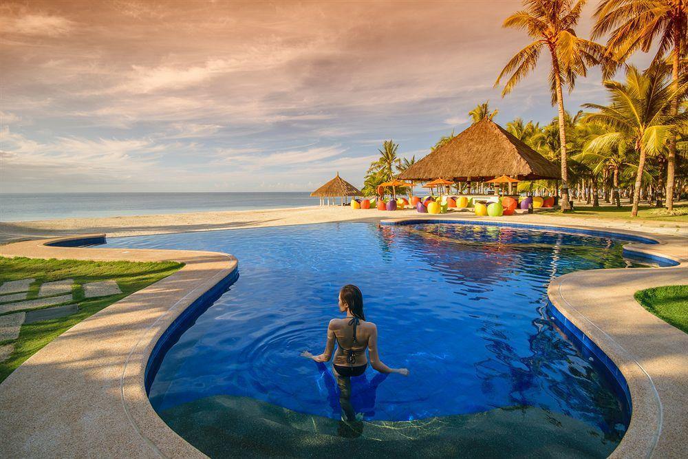 Oceanica Resort Panglao, Bohol Exteriör bild Infinity pool at the beach