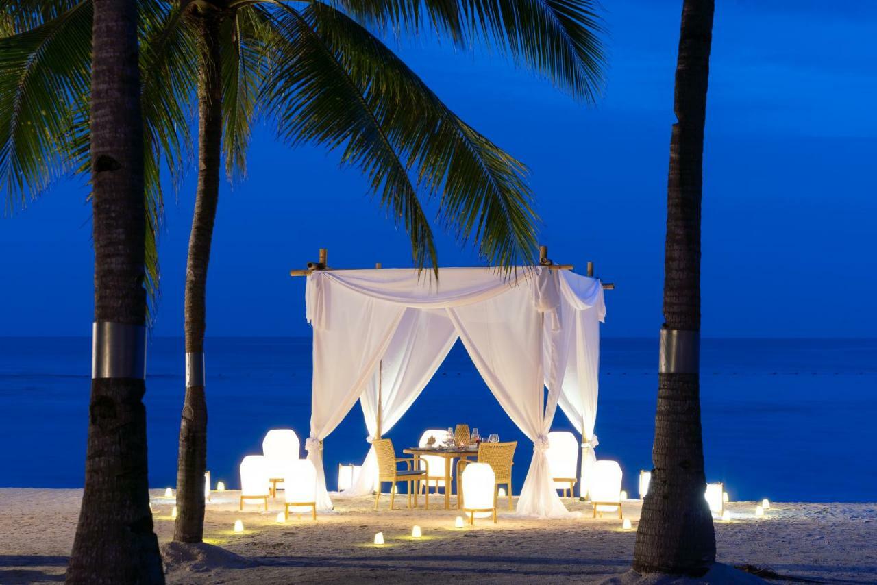 Oceanica Resort Panglao, Bohol Exteriör bild A beachside dining experience at the resort