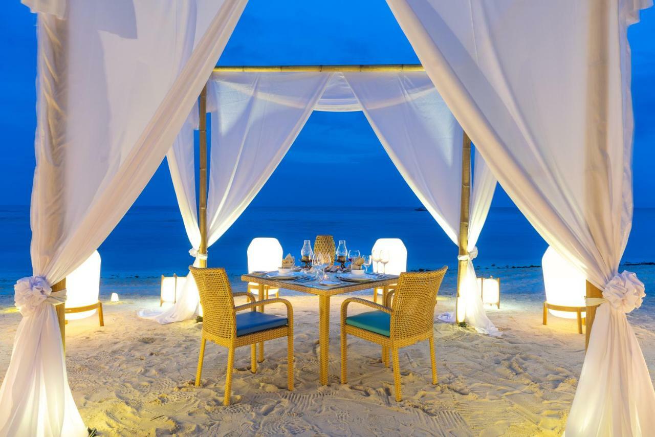 Oceanica Resort Panglao, Bohol Exteriör bild A beachside dining experience at the resort