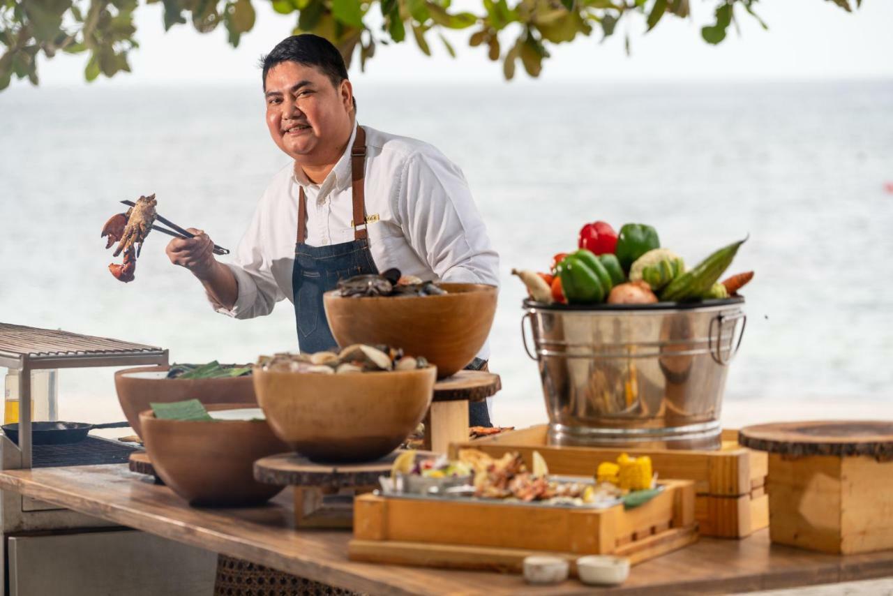 Oceanica Resort Panglao, Bohol Exteriör bild Chef preparing food at the hotel