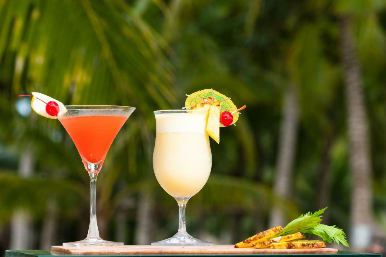 Oceanica Resort Panglao, Bohol Exteriör bild Two tropical drinks